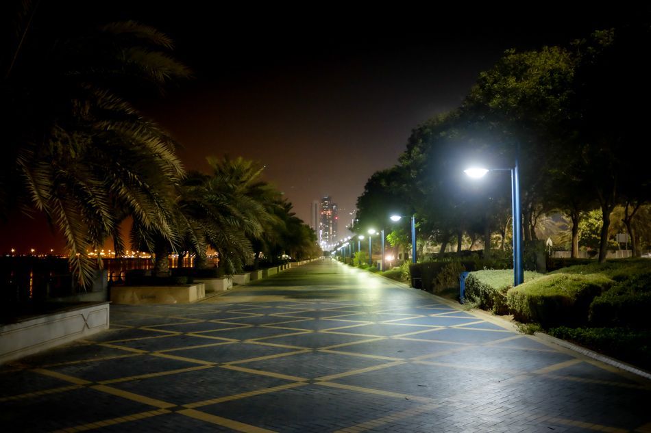 Corniche sidewalk. 1/30s f/2 ISO3200 at 21:38