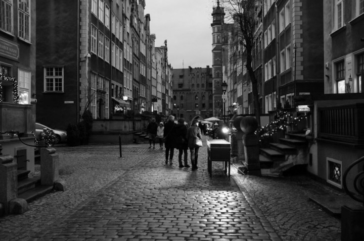 stands with amber jewellery at the Mariacka street. 