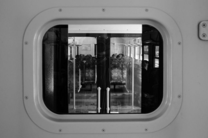 View through the window to the next carriage. For me this photo looks like I would look at the nuclear reactor.