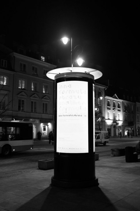 Illuminated notice board at Krakowskie Przedmieście street